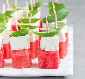Watermelon salad or caprese with watermelon, feta and basil