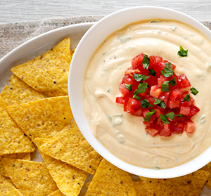Getty 1176276963 Homemade cheesy dip in a bowl